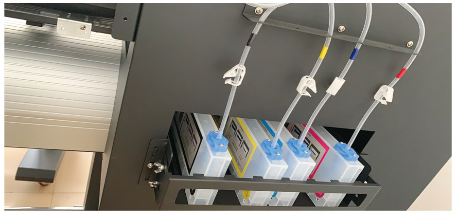 Printer ink supply unit: 4×1 - liter CMYK ink cartridges, eco - solvent/sublimation ink compatible, transparent tubes connected to print head